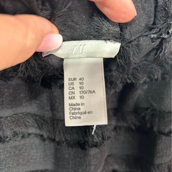 Woman’s black fringe skirt with pockets. Size 10. - Picture 6 of 10